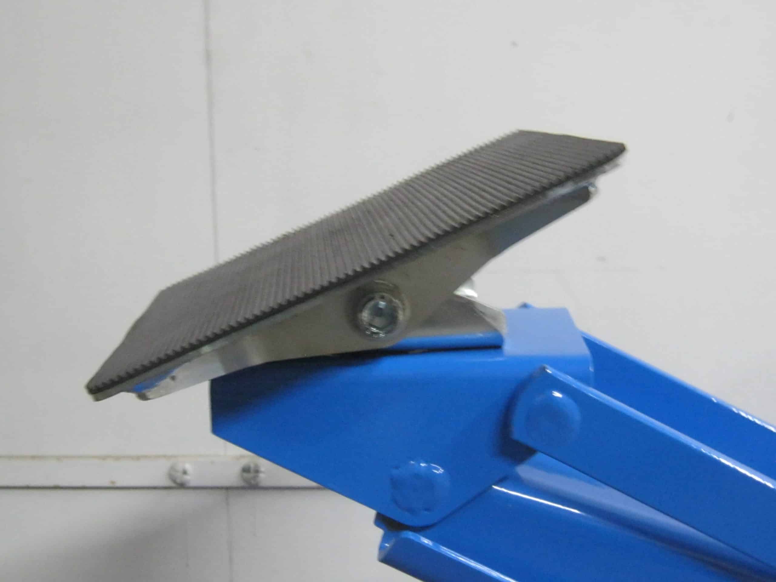 Swivel jack pad from side showing pad and material